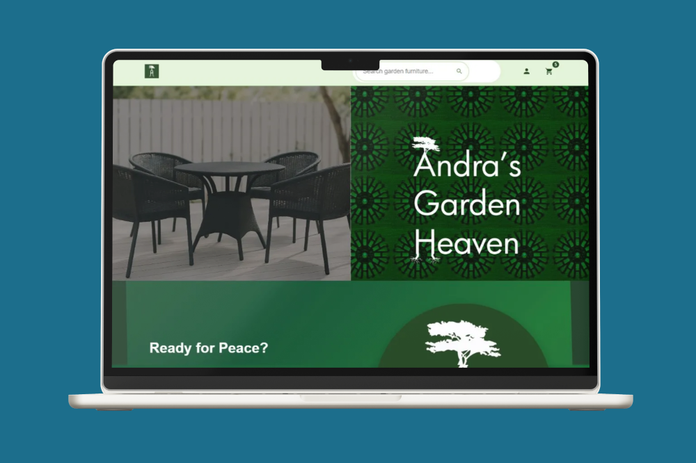Andra's Garden Heaven desktop site mocked up on Macbook — homepage above the fold